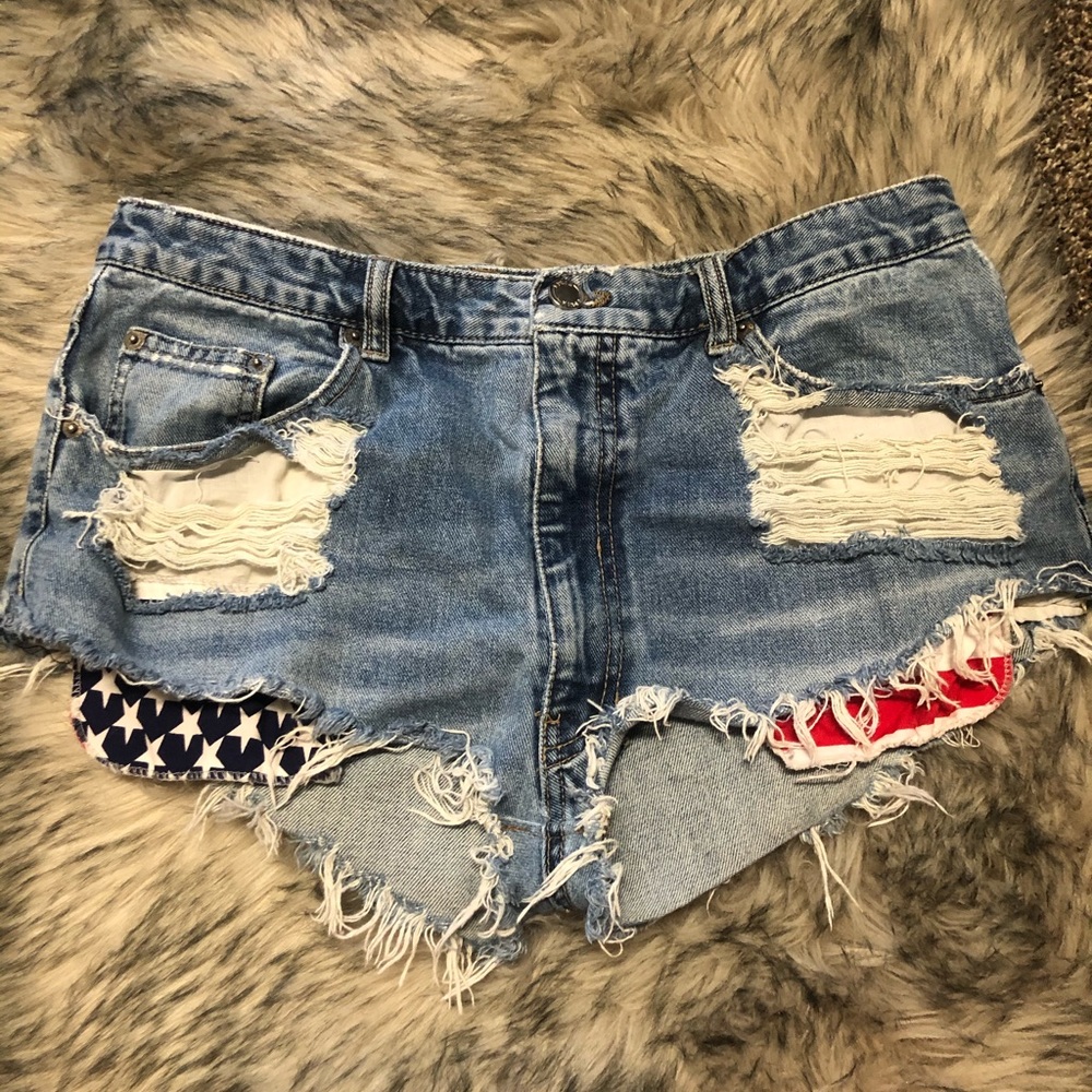 Destressed jean shorts